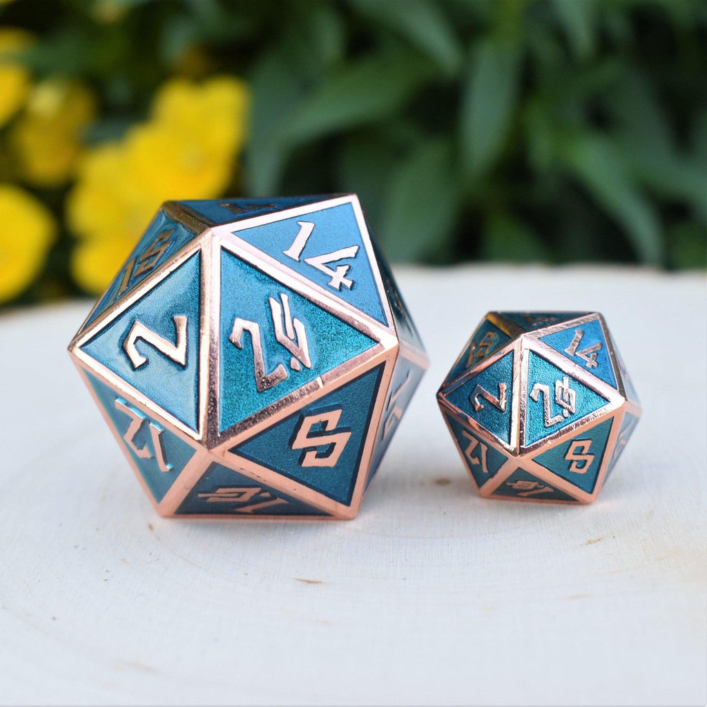 A large aqua single D20 with gold numbers in a Nordic font